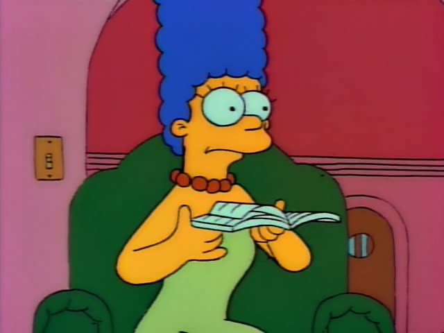 Marge sits in a green armchair reading a magazine, while Homer and Bart sit nearby in a pink room
