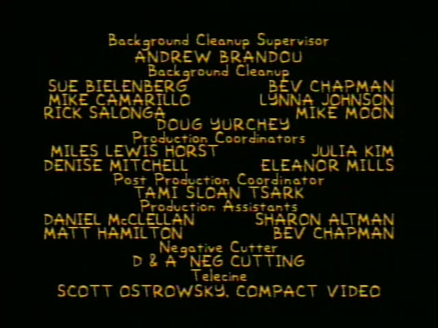 A black end-credit sequence with yellow text over a dark background