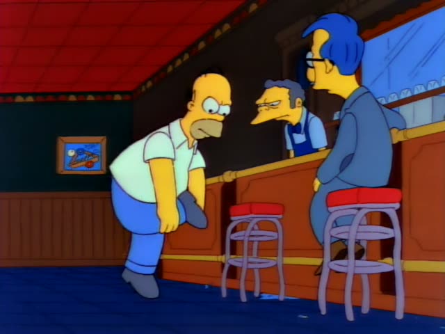 Homer Simpson stands hunched at a wooden bar in a tavern, gesturing with his hands and glaring as he speaks, while Moe…