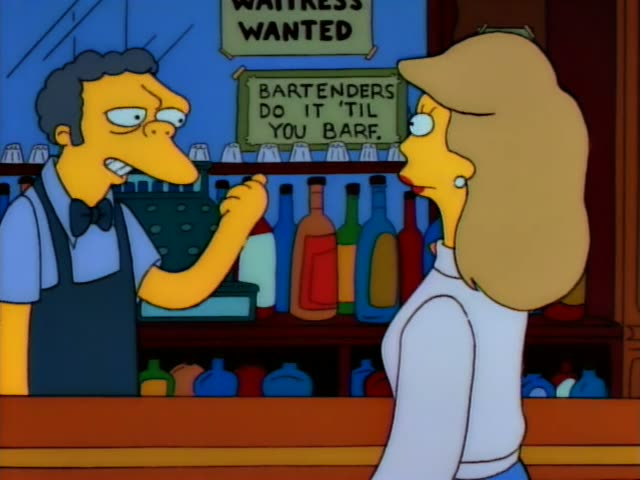 Moe stands behind a bar lined with bottles and a cash register, while a woman with long, straight, light-brown hair…