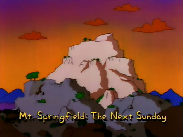 Homer and Lisa Simpson hike across a rocky desert ridge at sunset beneath the title card 'Mt. Springfield: The Next Sunday'
