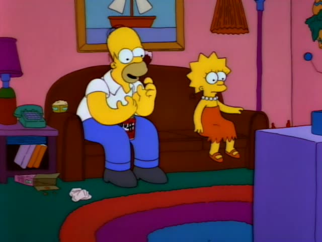 Homer Simpson sits on the brown couch in the pink living room, then jumps up with his fists raised and mouth wide open…