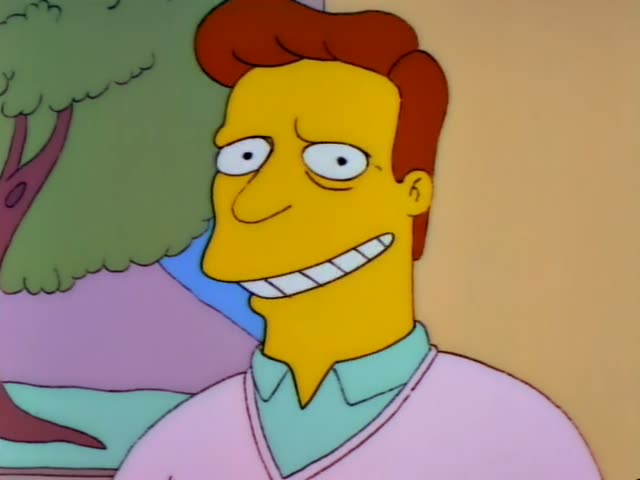 Troy McClure stands before a backdrop of a green tree and purple and blue shapes