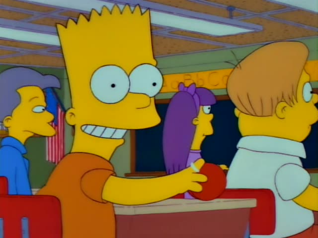 Bart sits at a classroom desk under a chalkboard with ABC letters, stretching a rubber band with a red ball while classmates…