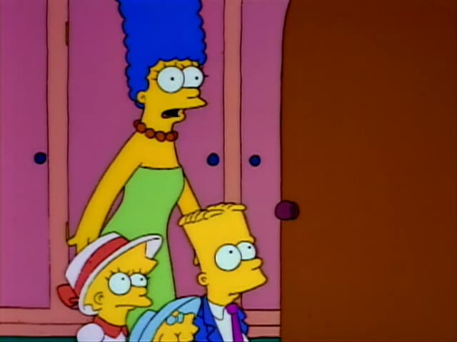 Marge with her tall blue beehive and green dress, Bart in a blue suit, Lisa in a white hat with a red bow, and baby Maggie…