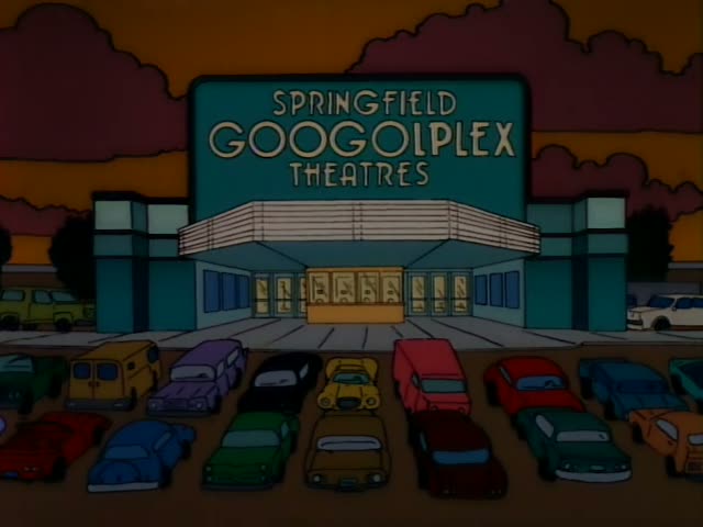 Homer and Lenny sit in the dark rows of the Springfield Googolplex Theatres while a green monster film plays on the screen