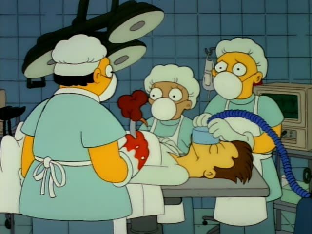 Homer in green surgical scrubs, with Carl in the middle and Marge with her tall beehive under a surgical cap on the right…