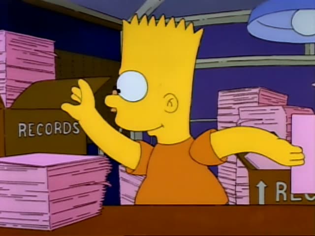 Bart, Lisa and Maggie work behind a counter stacked with pink record sleeves and cardboard boxes labeled RECORDS: Bart…