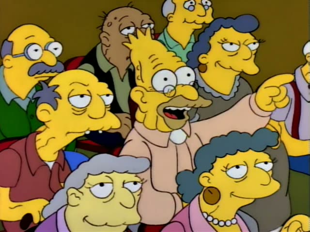Grampa stands in a crowd of older townspeople alongside Mr. Burns, the frail stooped man with a hooked nose and grey hair…