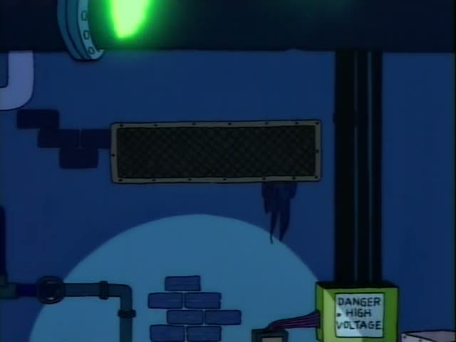 Homer sits arms crossed on a wooden crate in a dim basement beside leaking barrels with radiation symbols, while a bald man…