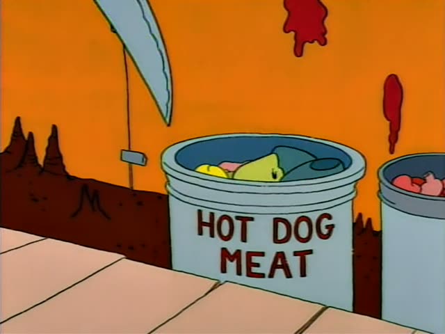 Homer is strapped into a metal chair while a blue horned devil leans beside him, grinning and then narrowing his eyes…