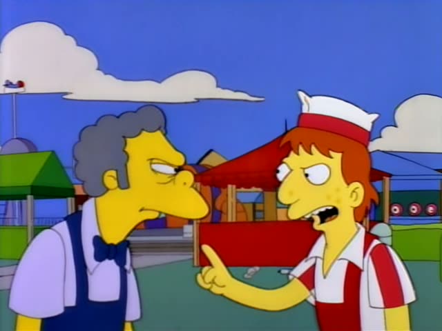 Moe stands on the left facing a young man with reddish-orange hair, a white cap and a red-and-white striped vest, who jabs…