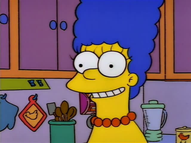 Marge stands in the purple kitchen holding a pink object near her mouth, first wide-eyed and then smiling with eyes…