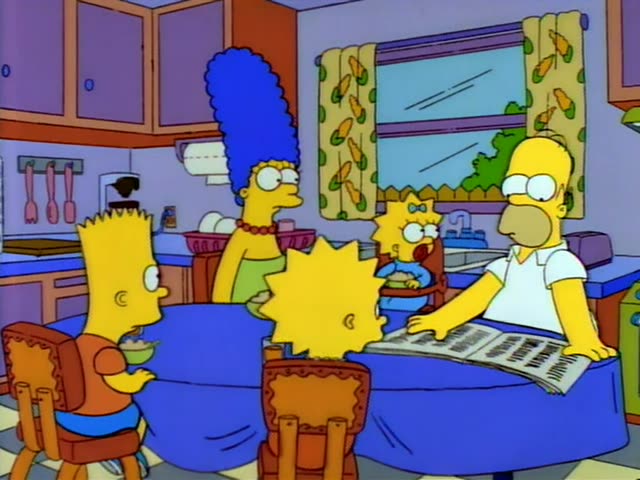 Homer reads a newspaper at the blue-covered kitchen table while Marge stands behind Bart, Lisa and Maggie, who sit…