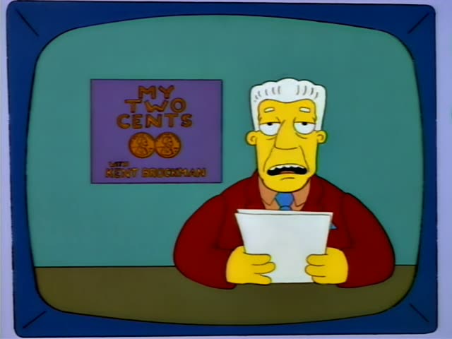 Kent Brockman sits at a desk behind a purple sign reading "My Two Cents with Kent Brockman" on a teal backdrop…