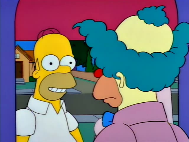 Homer Simpson stands at a doorway talking with Krusty the Clown, who has a red nose, teal curly hair, a bald yellow head…