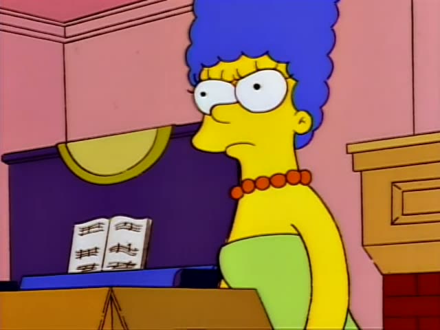 Marge stands at a piano with sheet music on the stand and a pink wall behind her, looking unimpressed while Ned Flanders…