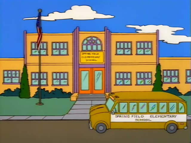 Principal Skinner in a blue suit and Mrs. Krabappel stand at the front of a classroom while Marge and Milhouse sit among…