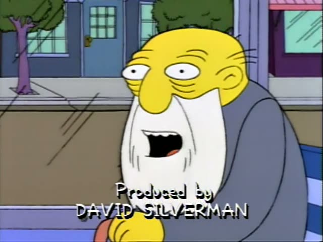 An elderly bald man with a long white beard and a grey coat, who is not one of the regulars listed, stands on a street…