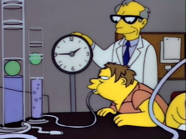 A bald Homer with stubble in a white shirt sits at a lab bench with a clear tube in his mouth, while a grey-haired man…