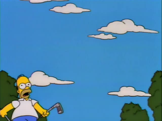 Homer Simpson stands holding a golf club against a blue sky with clouds and green bushes, then raises the club overhead…