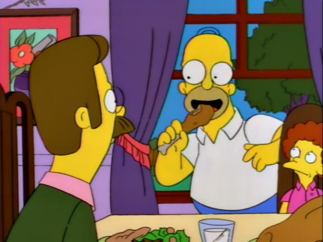 Homer and Ned Flanders sit at a dinner table while a woman with frizzy red hair and a pink top watches