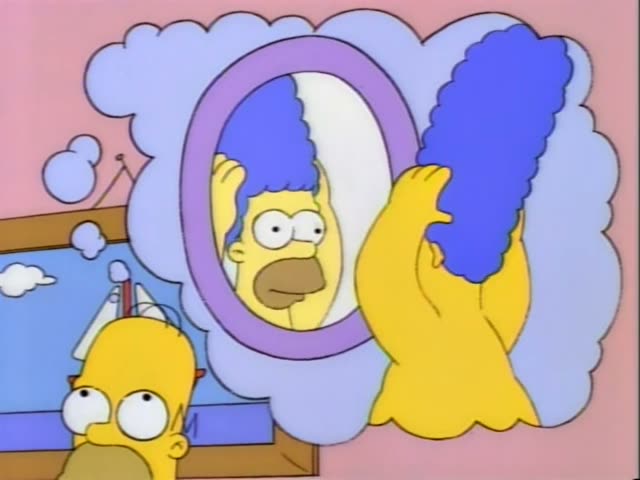 Homer watches from the lower left of a pink bathroom while a bald, heavyset man wearing a tall blue beehive wig, also Homer…