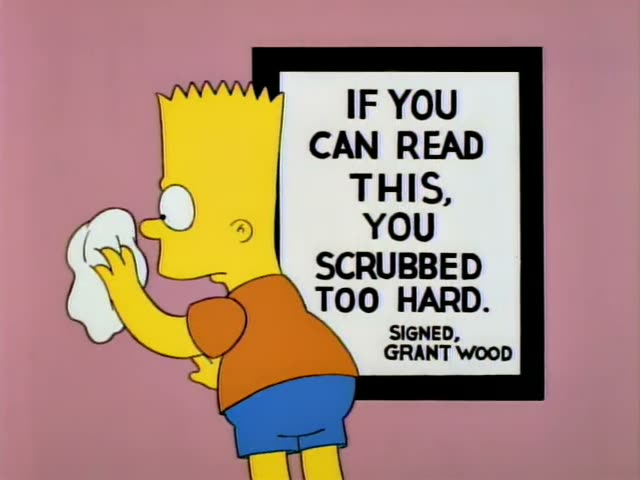 Bart Simpson stands in a pink room beside a green desk holding a phone