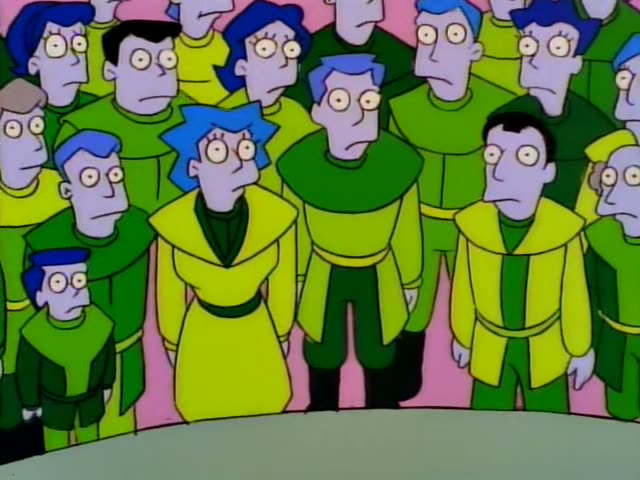 A crowd of wide-eyed, purple-skinned people with blue hair, dressed in green and yellow robes, stands packed together…