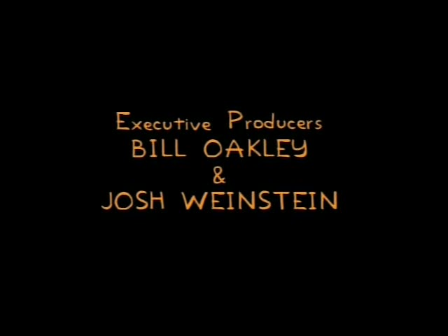 A plain black background with orange credit text