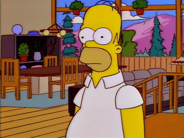 Homer stands at the doorway of a wood-paneled house while a stranger with a bushy reddish-orange beard, a pompadour-style…