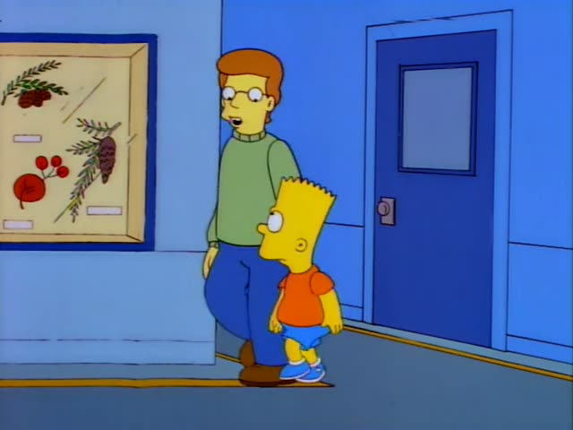 Bart Simpson walks down a blue hallway beside a man in a green sweater and glasses, passing a framed display of pressed…