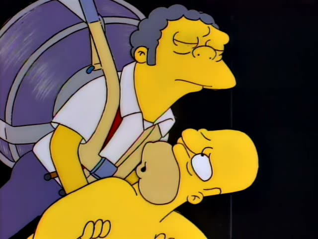 Moe grips a strap in front of a purple, grey-striped round object while holding Homer, a bald, shirtless man, against him…