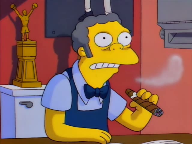Moe stands behind the bar in his Moe's tavern, holding a lit cigar and talking with a worried, sly expression while smoke…