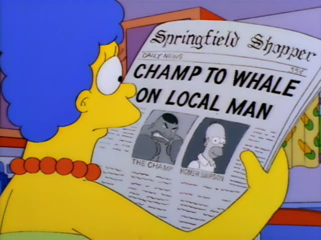 Marge Simpson stands at the kitchen counter holding up a Springfield Shopper newspaper headlined…
