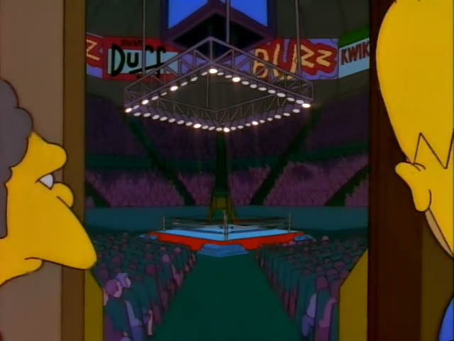 Moe and Homer stand together in a doorway that opens onto a large arena