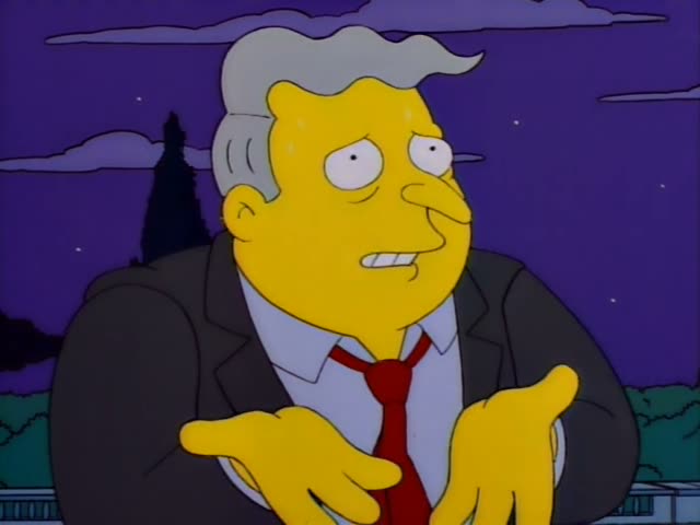 Kent Brockman is first seen at night against a purple sky with his hands clasped at his chest, then stands in an indoor…