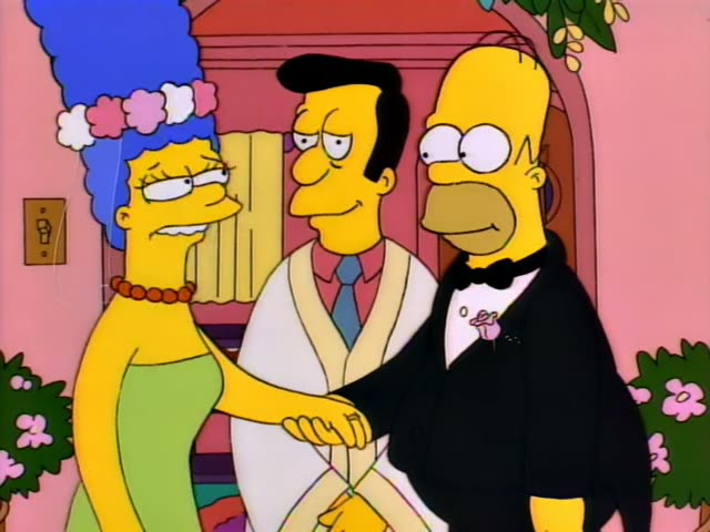 Marge and Homer stand beside a man in a white robe and blue tie under a pink floral arch with greenery