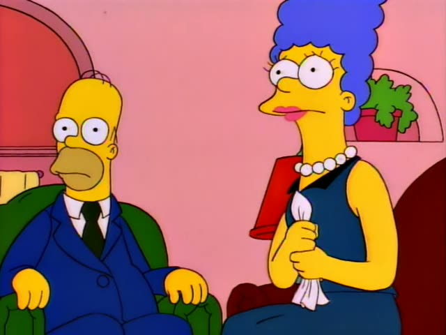 Principal Skinner and Milhouse are in a pink room with a framed family portrait and a framed photo on a wooden sideboard