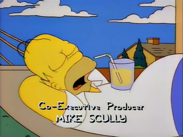 Homer lies back in a white lounge chair on a deck, sipping a glass of orange juice through a bendy straw while his eyes stay…