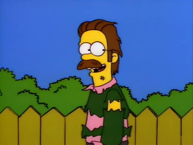 Ned Flanders stands by a wooden fence in his backyard, first talking and then standing beside a row of gravestones…