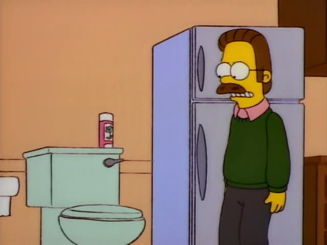 Ned Flanders stands beside a lavender refrigerator in a bathroom while a heavyset workman in a white shirt, orange cap…