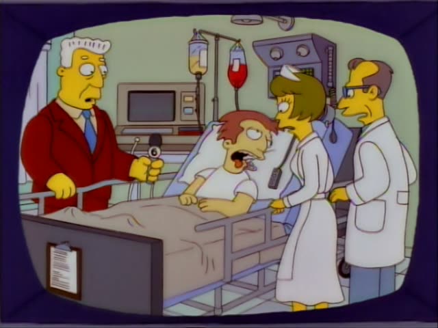 Kent Brockman first stands beside a hospital bed where a red-haired patient lies with his tongue out while a nurse…