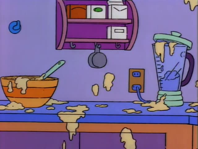 Bart and Lisa stand in a messy purple kitchen smeared with batter