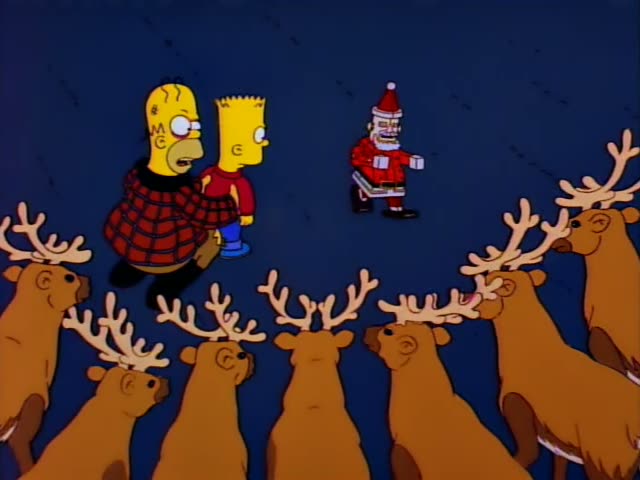 Homer Simpson in a red plaid shirt and Bart Simpson in a red jacket stand and kneel on a blue-lit lot, with a fence and pine…