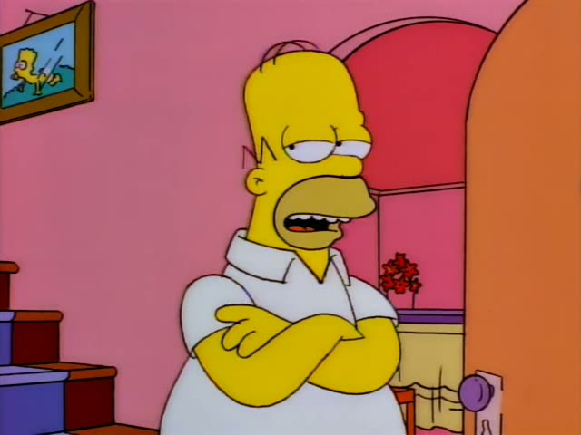 Homer Simpson stands in the pink living room near the stairs and an orange archway, with a framed painting on the wall…