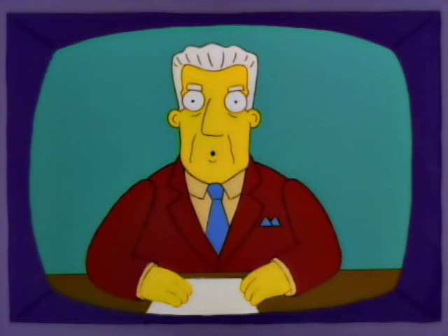 Kent Brockman sits at a brown desk behind a sheet of paper on a teal TV-screen backdrop framed in purple