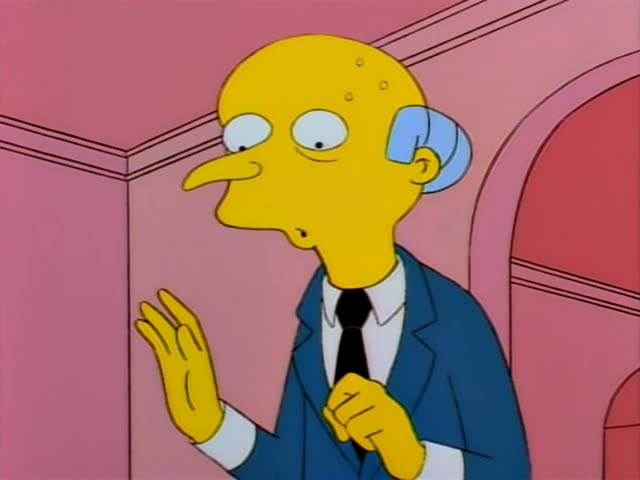 Mr. Burns stands in a pink room with a brown archway and talks and gestures with his hands, first with one hand raised…