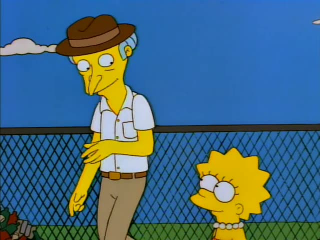 Mr. Burns and Lisa in her red dress and pearl necklace stand by a chain-link fence beside a pile of litter and bottles…