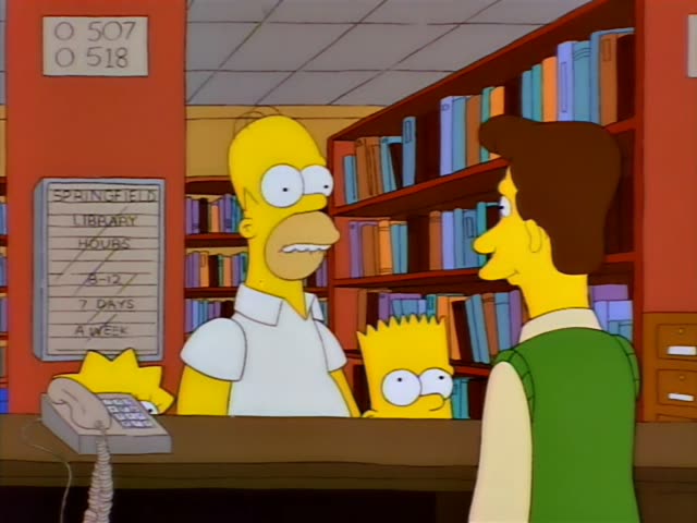 Homer stands at the library desk with Bart beside him and Lisa's star-shaped hair just visible at the lower left…